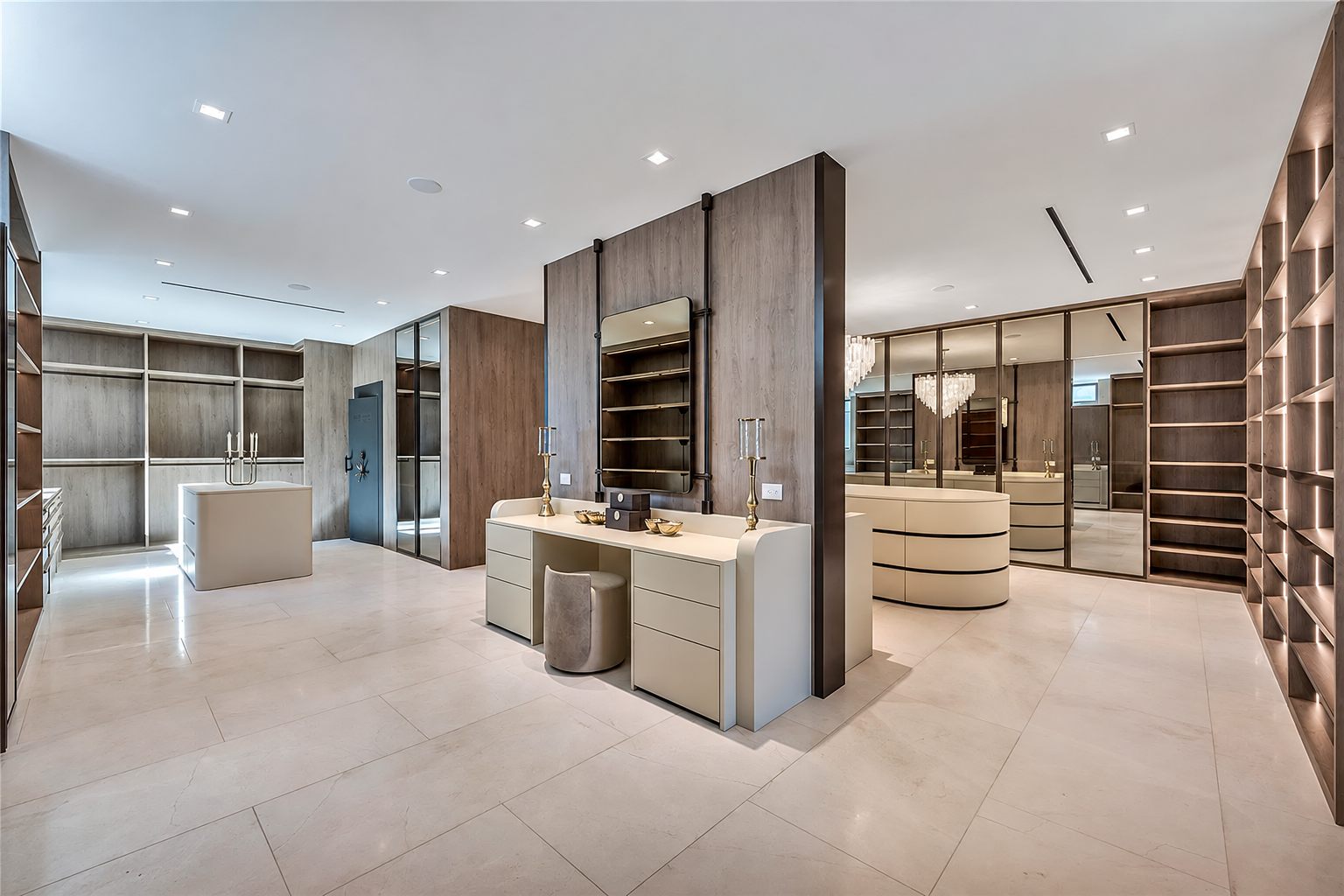 Dressing room with vanity, wardrobe walls and mirrored cabinetry