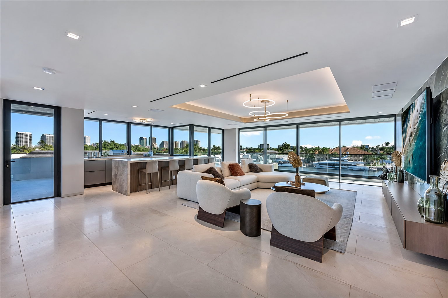 Upper-level lounge with wet bar and water views